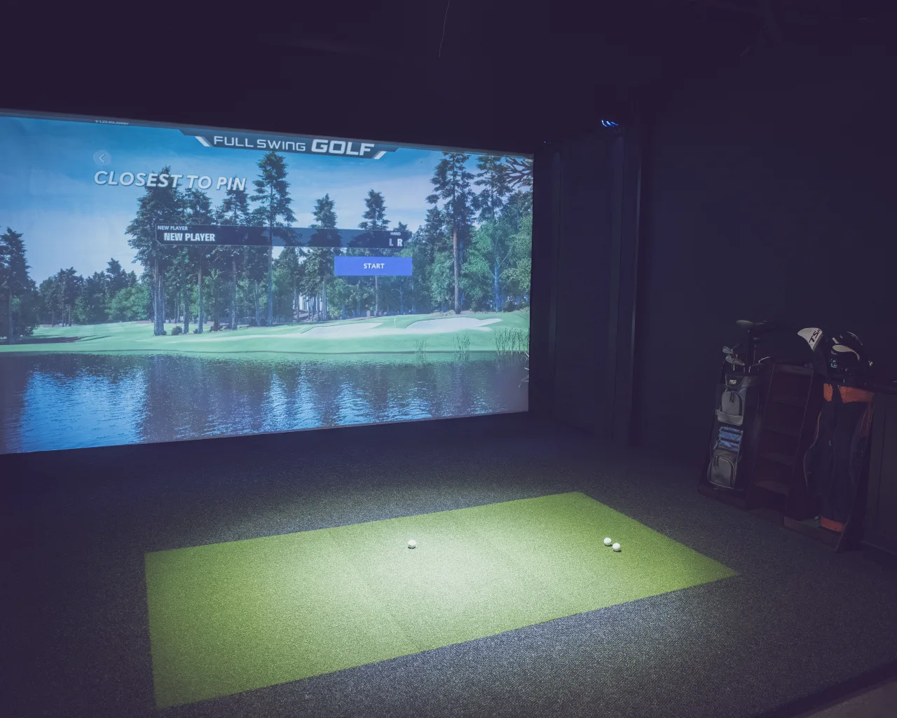 Full Swing simulator screen ready for play at Swing Away Golf Club
